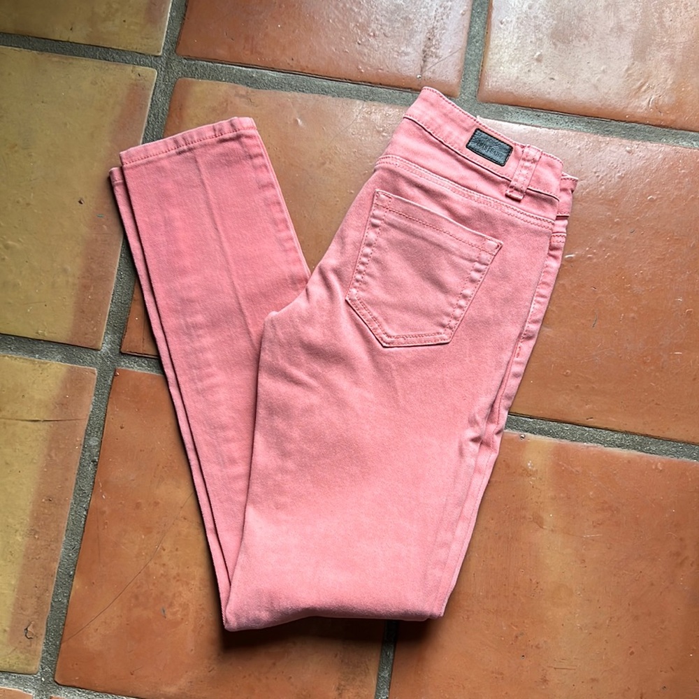 Light pink skinny jeans
